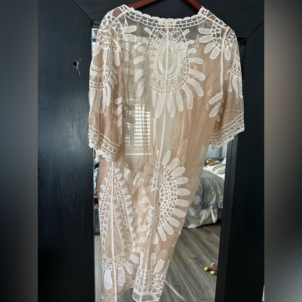 Light tan sheer cover